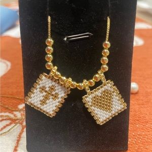 Necklace and bracelet set gold plated, adjustable straps for both.